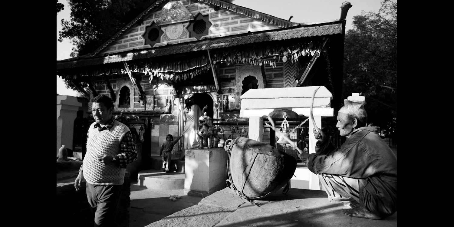 
            Doti, 2007 Hira Parki has been playing his drum outside the Shaileshwori temple since he was ten years old. But he had not entered the temple even after sixty-four years of doing this. Even when Dalit activists fought and won the right to enter the temple, he was too afraid to enter. When activists dragged him in, he screamed fearing death and passed out. Photo Credit/Dalit: a quest for dignity