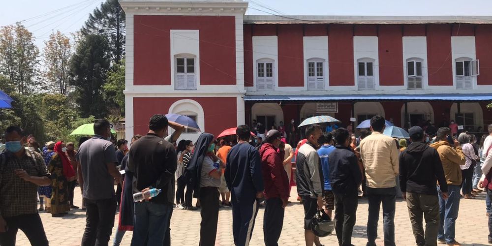 
            Nepalis line up to get the Verocell vaccine on April 26 at Nepal Police hospital.